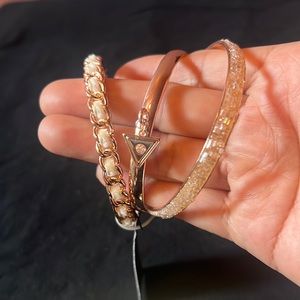 Guess pink goldtone bracelet comes with 3